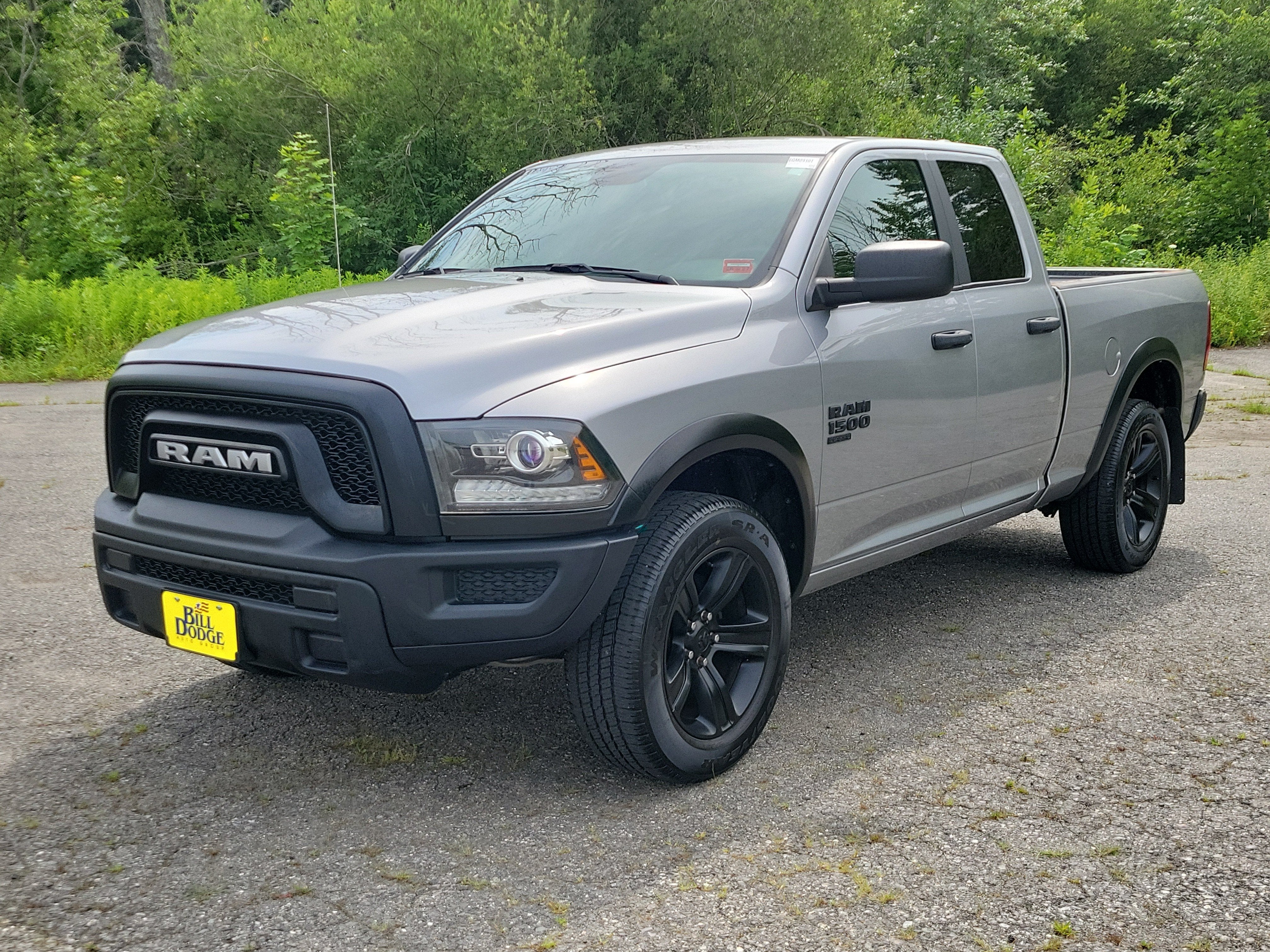 2022 RAM 1500 Classic Warlock Quad Cab 4x4 6'4" Box in Silver — front three-quarter view