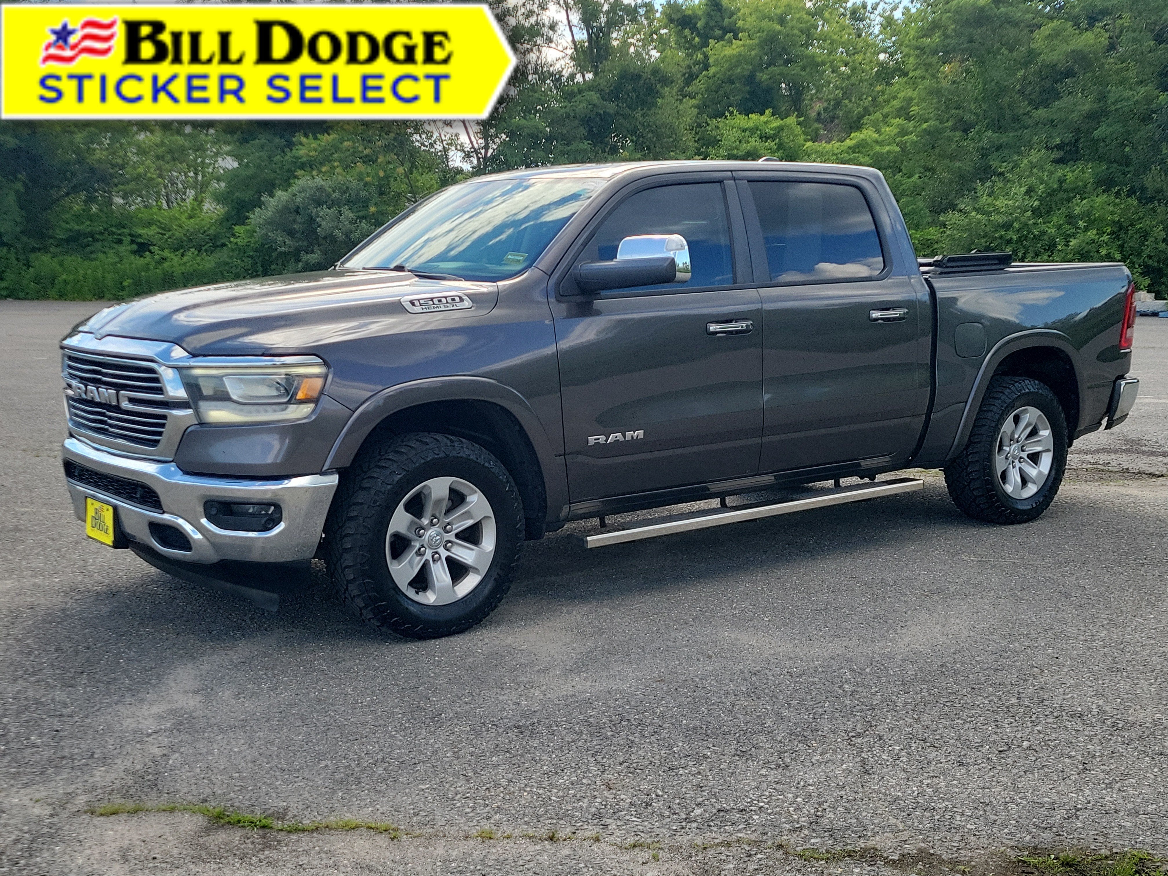 2019 RAM 1500 Laramie Crew Cab 4x4 5'7" Box in Gray — front three-quarter view