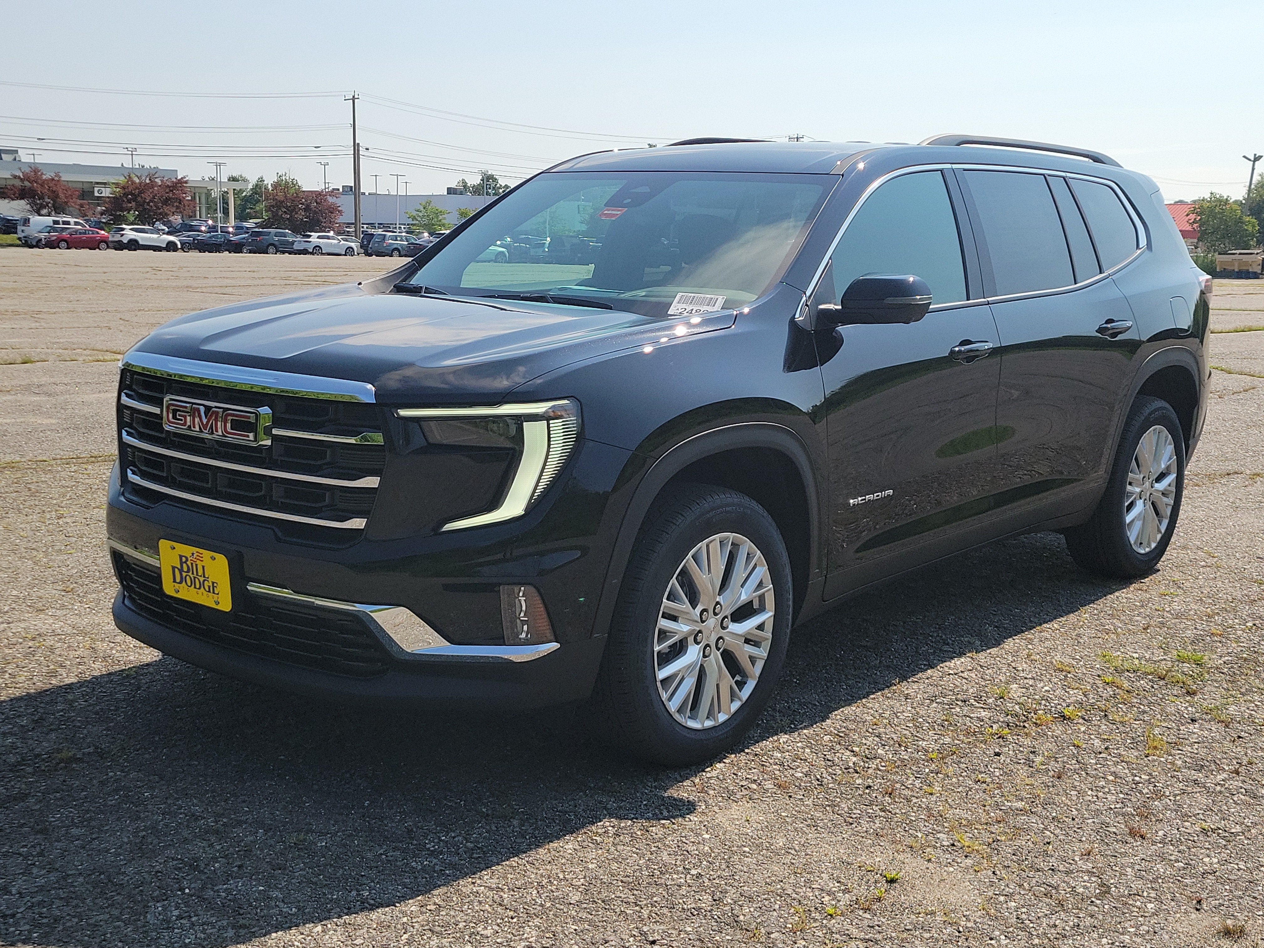 2026 GMC Acadia Elevation in Ebony Twilight Metallic — front three-quarter view