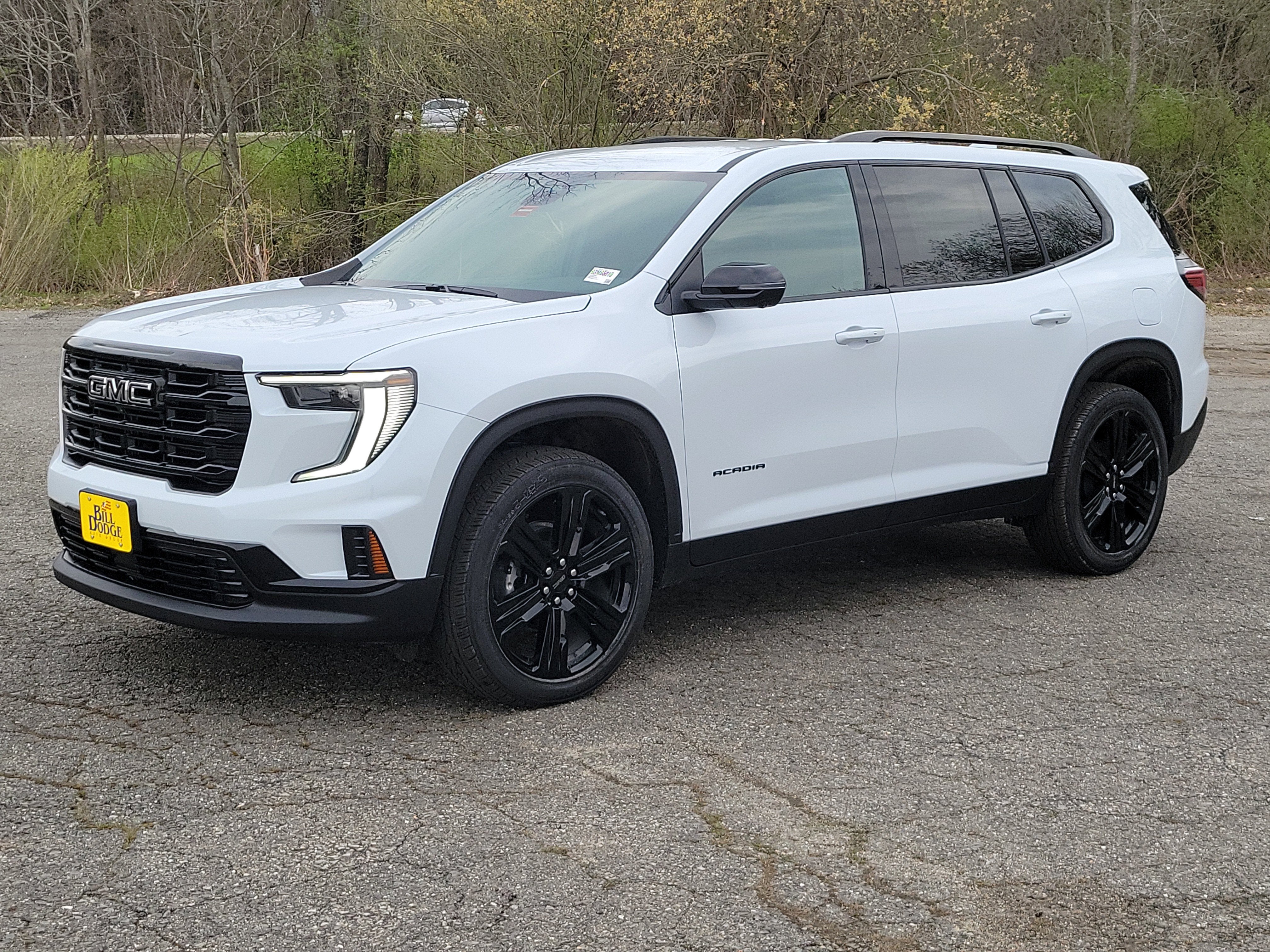 2026 GMC Acadia Elevation in Glacier White Tricoat — front three-quarter view