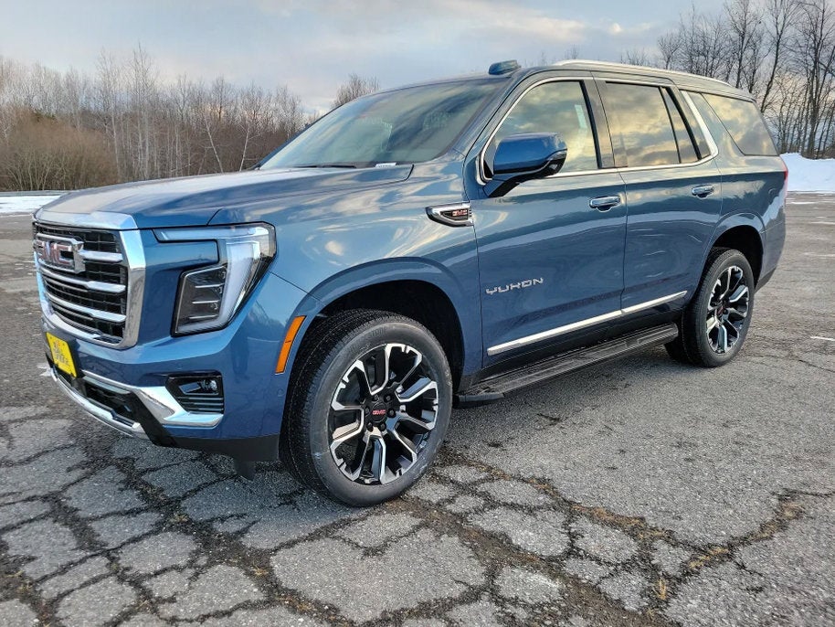 2026 GMC Yukon Elevation in Downpour Metallic — front three-quarter view