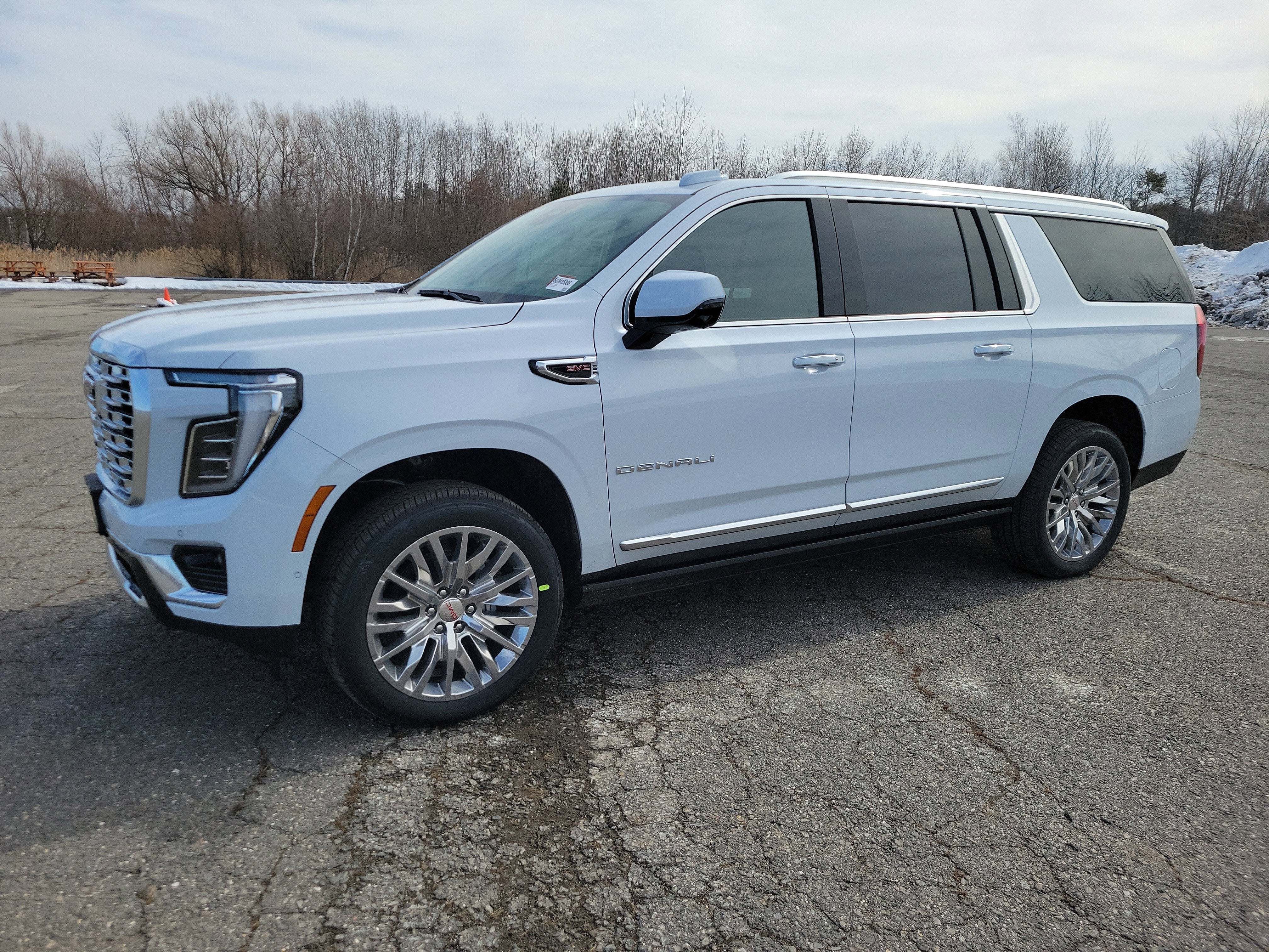 2026 GMC Yukon XL Denali in Glacier White Tricoat — front three-quarter view