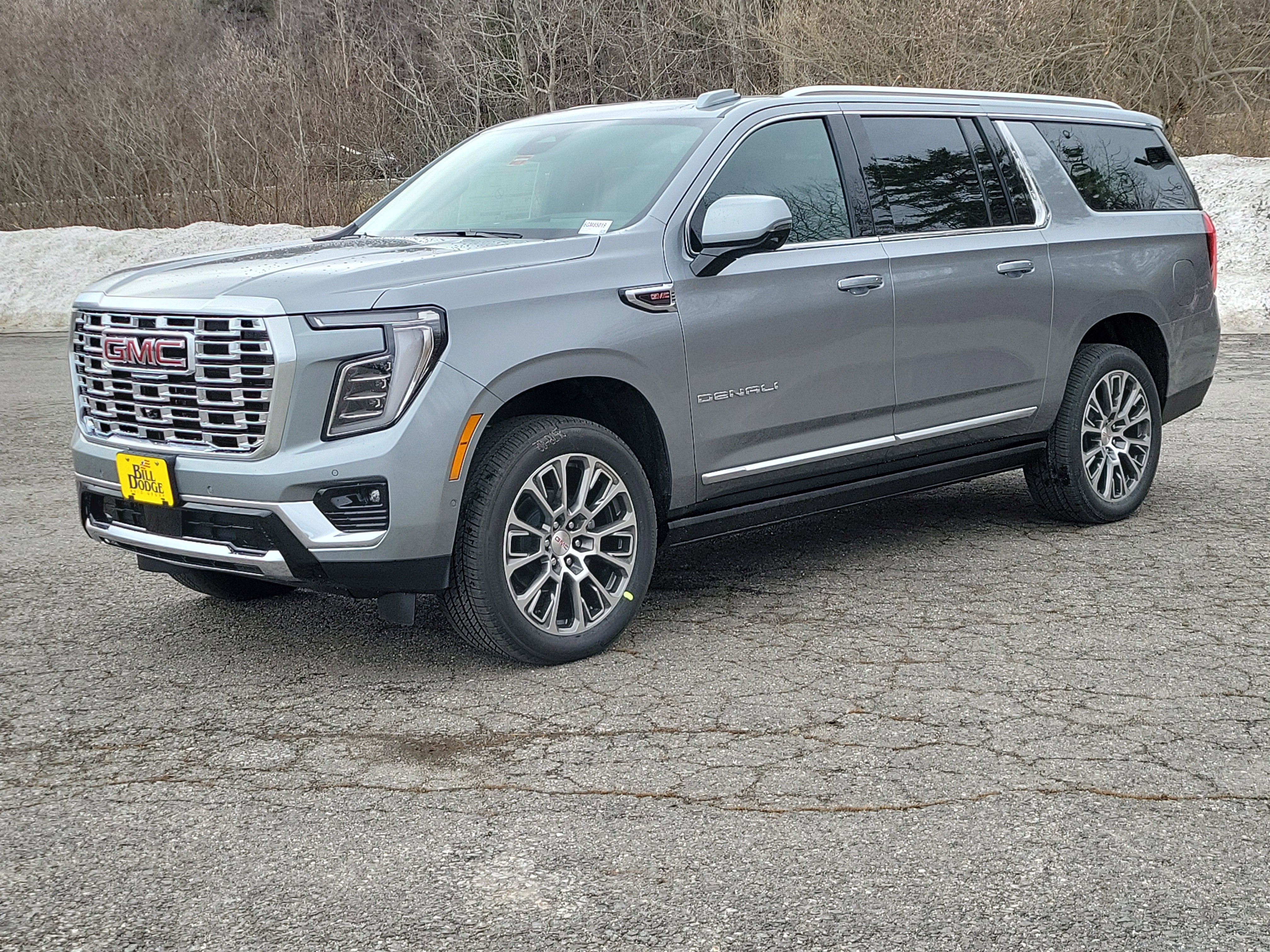 2026 GMC Yukon XL Denali in Sterling Metallic — front three-quarter view