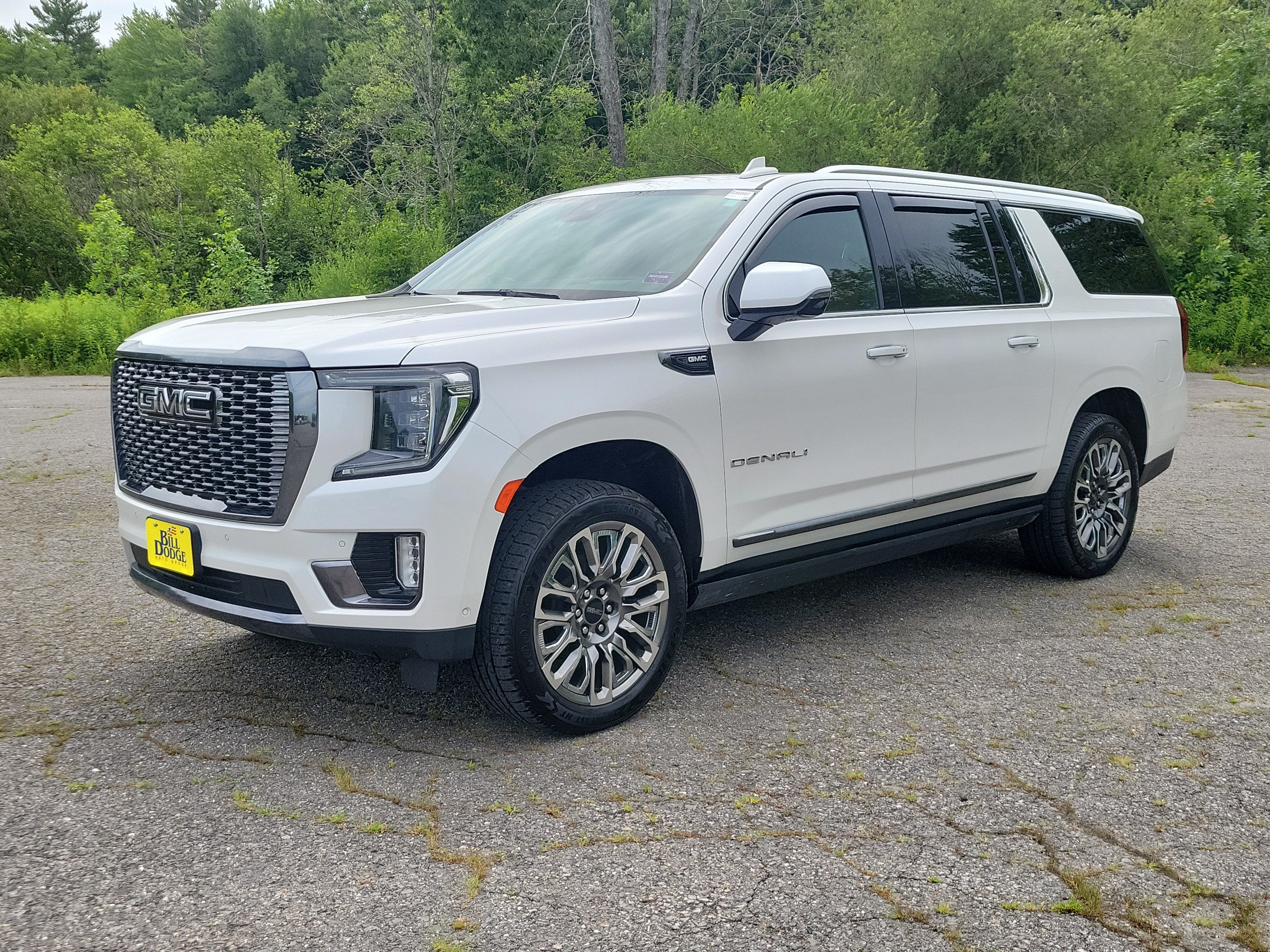 2023 GMC Yukon XL Denali Ultimate in White Frost Tricoat — front three-quarter view