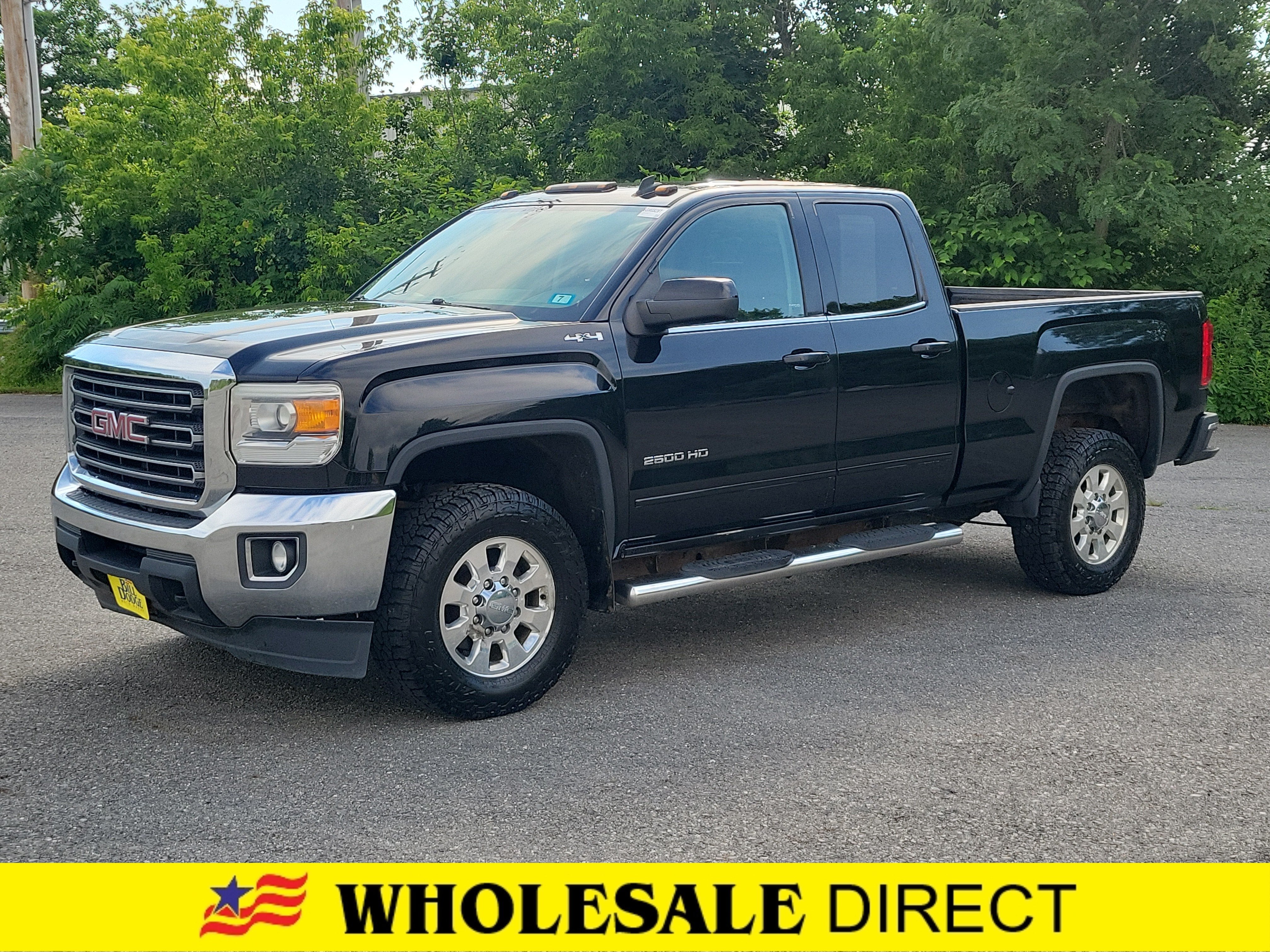 2015 GMC Sierra 2500 HD SLE in Onyx Black — front three-quarter view