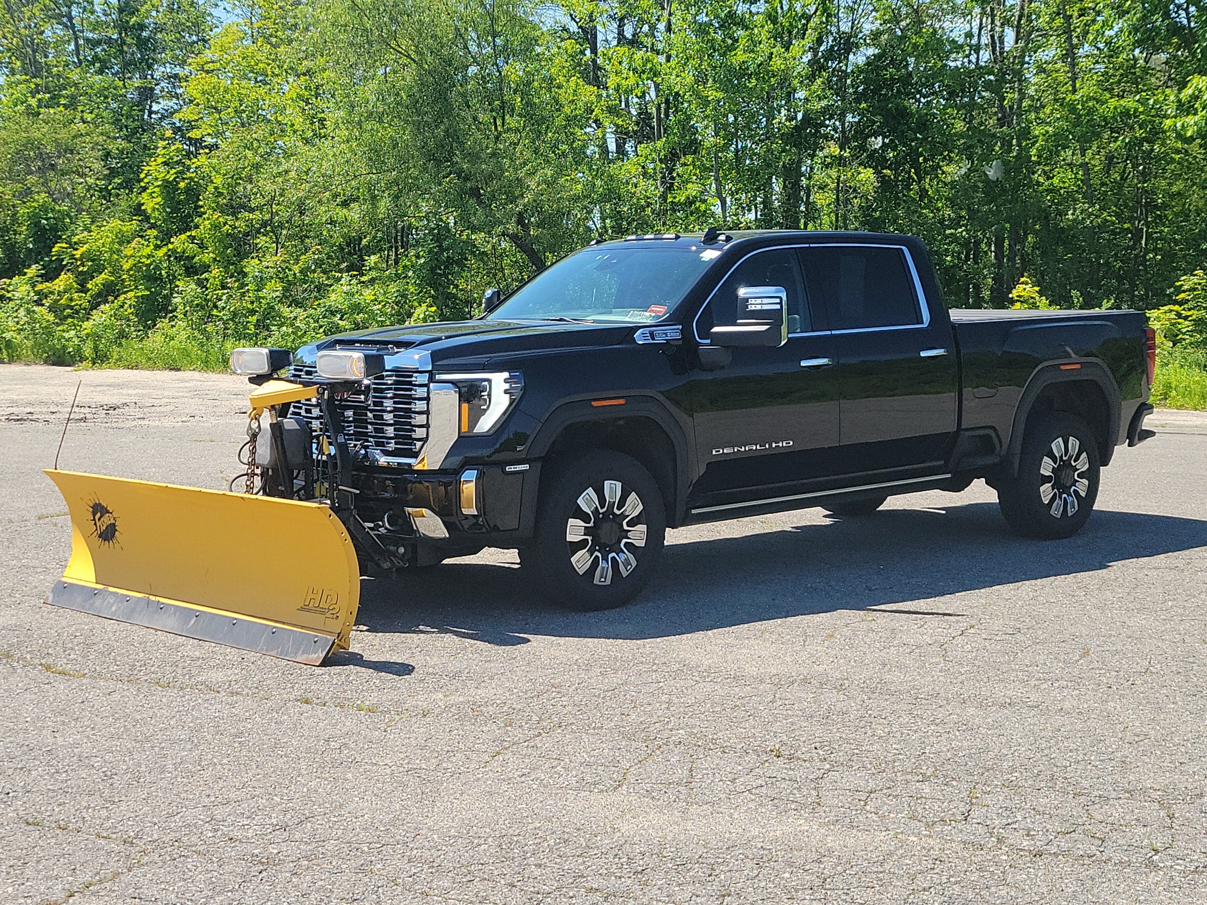 2025 GMC Sierra 2500 HD Denali in Onyx Black — front three-quarter view