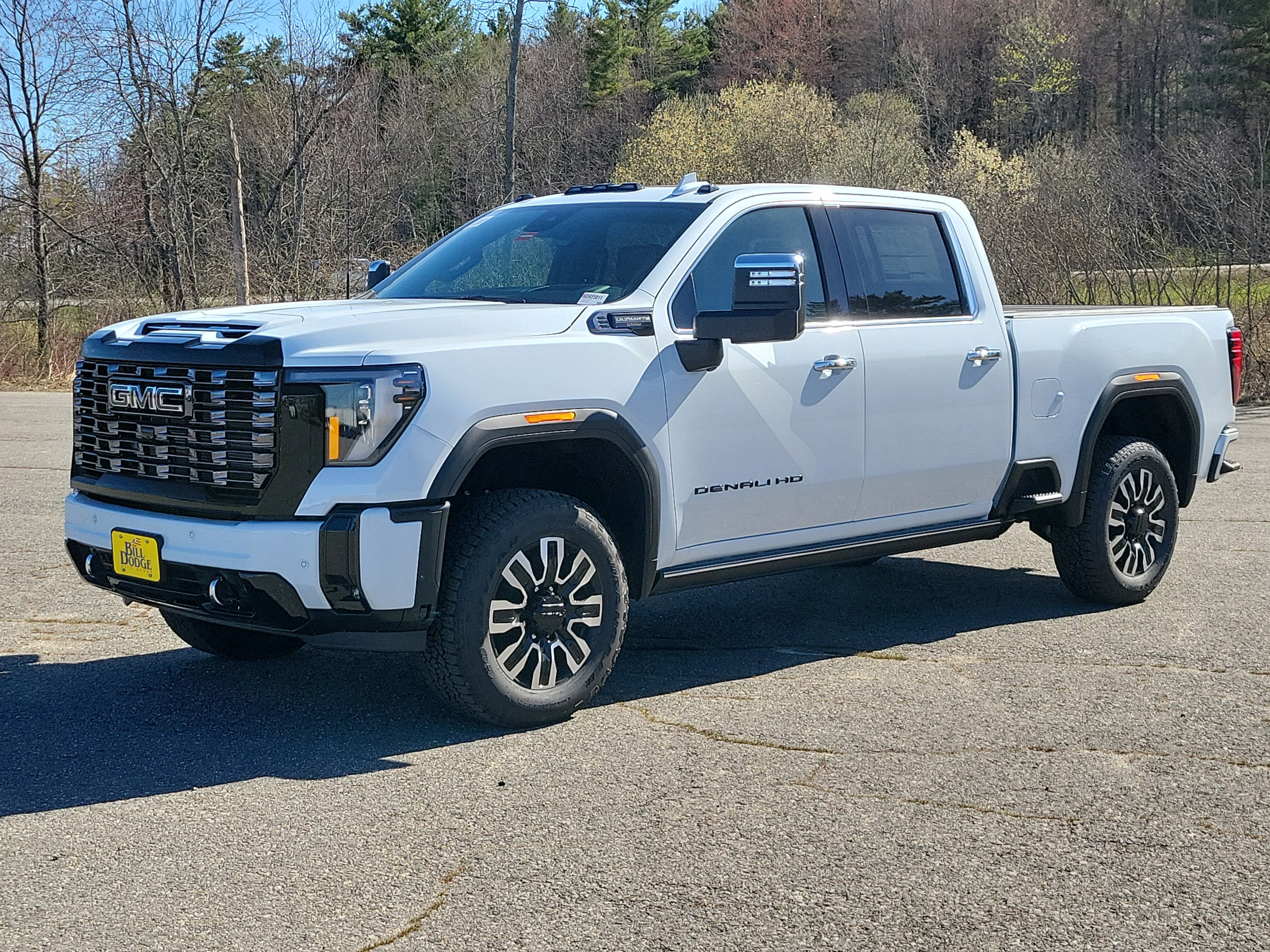 2026 GMC Sierra 2500 HD Denali Ultimate in Glacier White Tricoat — front three-quarter view