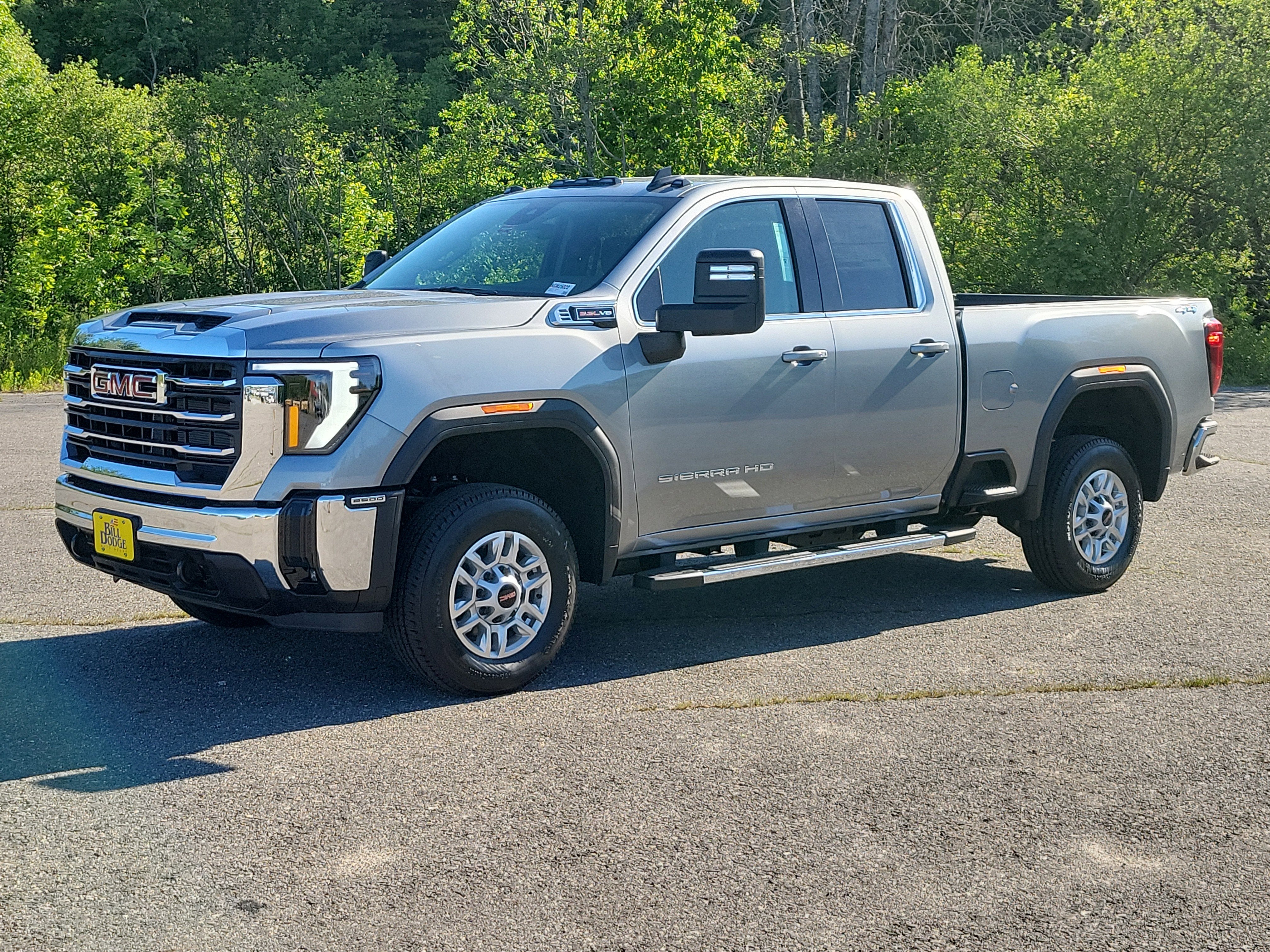 2026 GMC Sierra 2500 HD SLE in Sterling Metallic — front three-quarter view