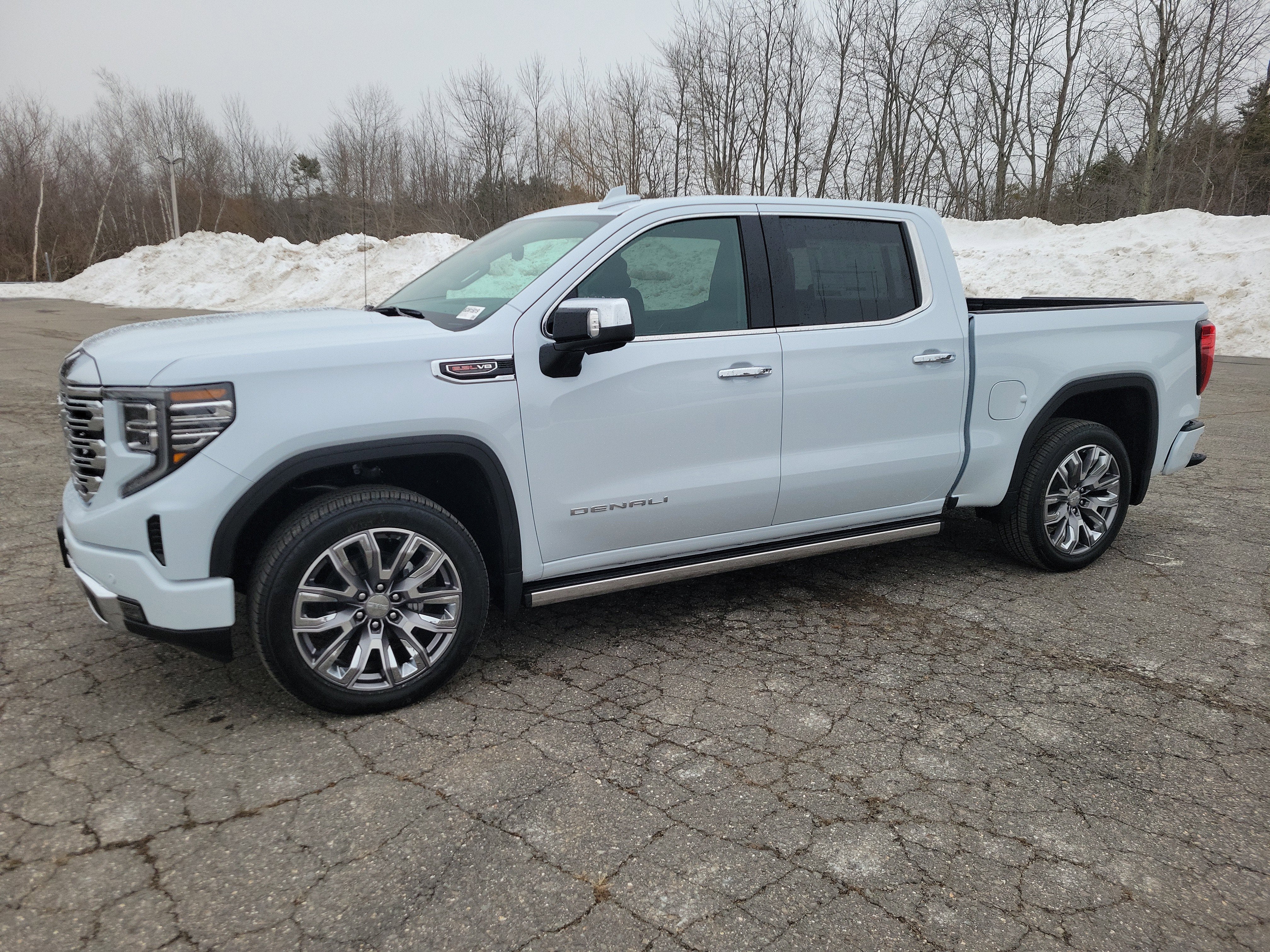 2026 GMC Sierra 1500 Denali in Glacier White Tricoat — front three-quarter view