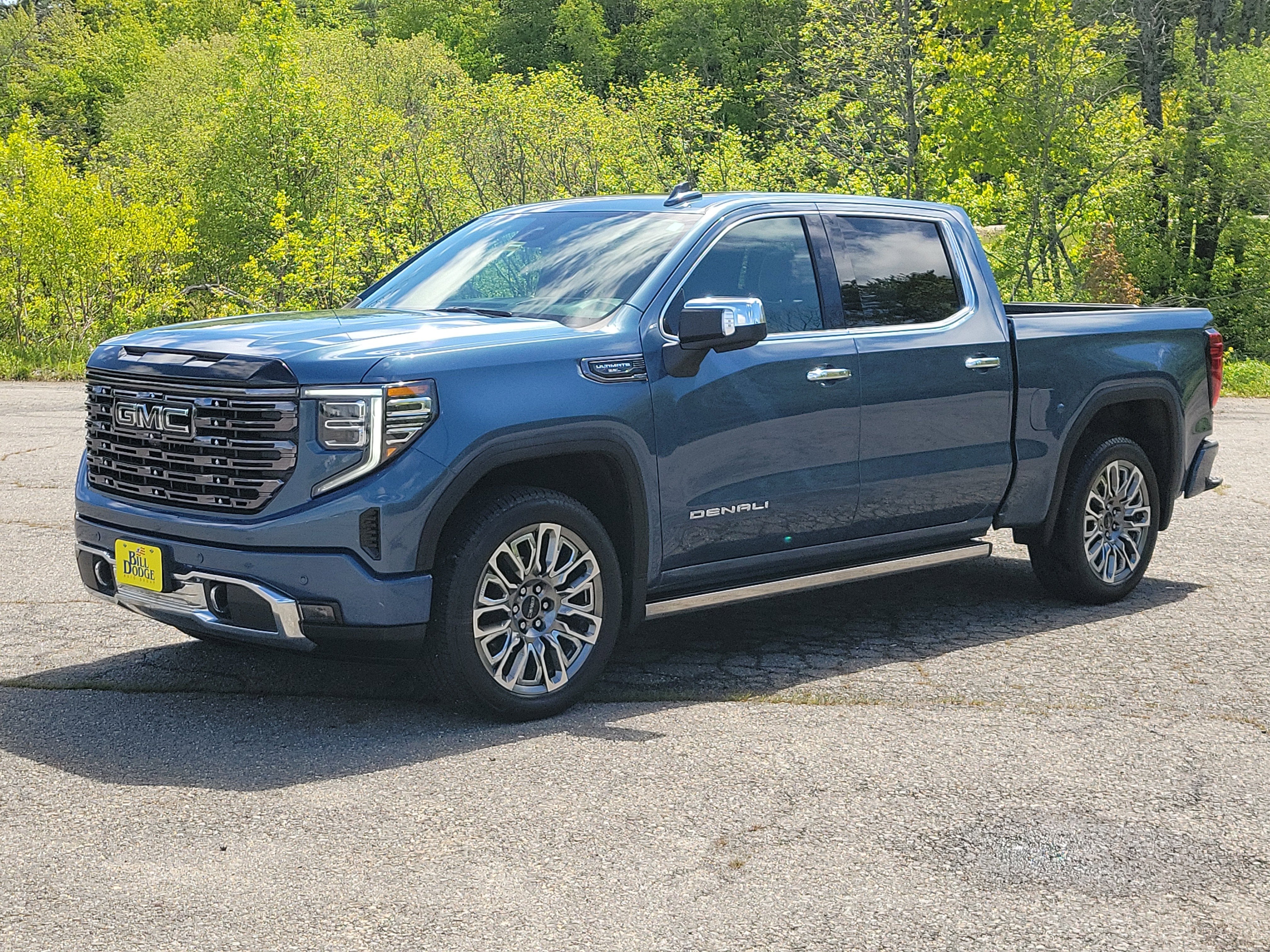 2025 GMC Sierra 1500 Denali Ultimate in Downpour Metallic — front three-quarter view