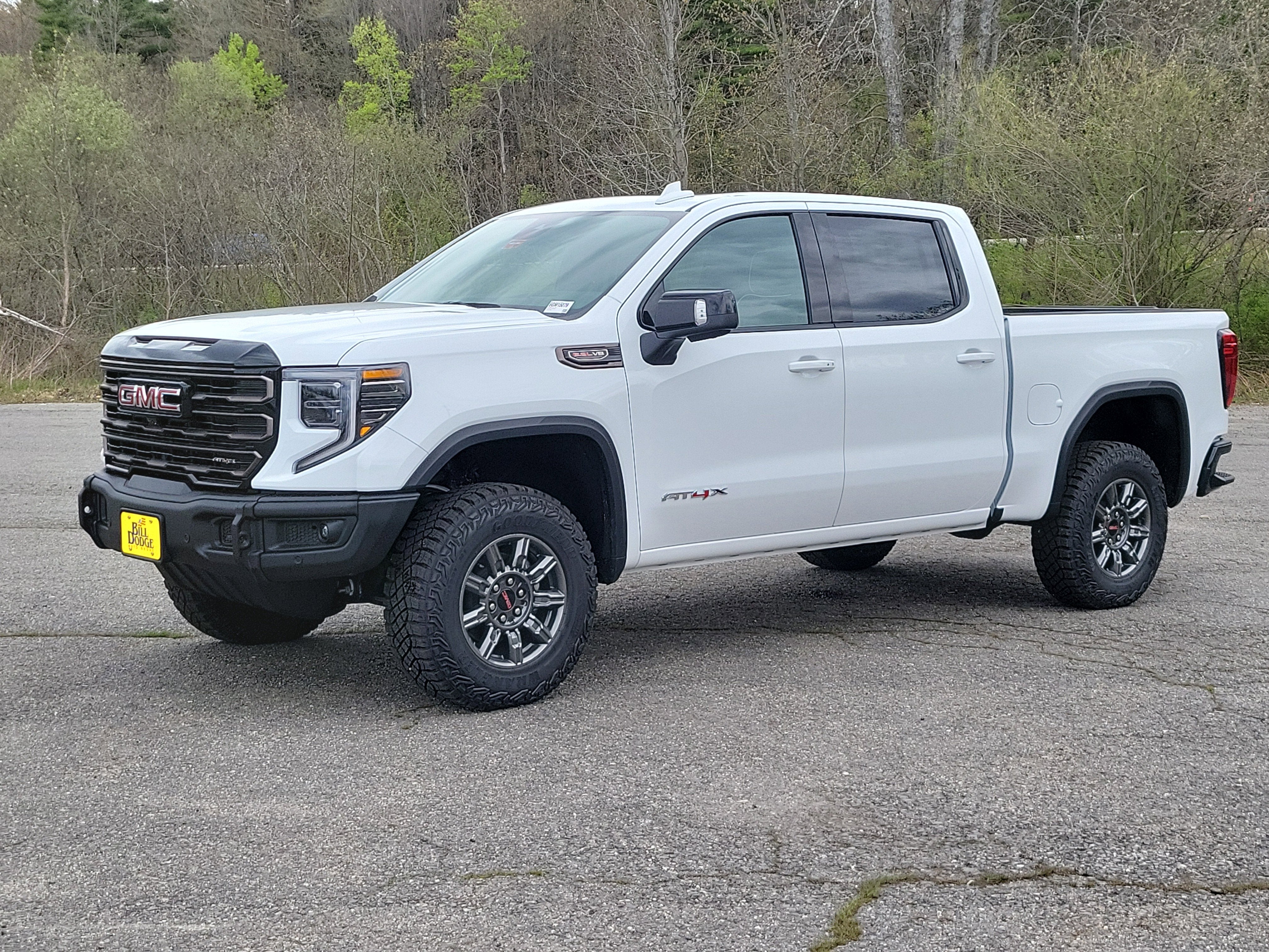2026 GMC Sierra 1500 AT4X in Summit White — front three-quarter view