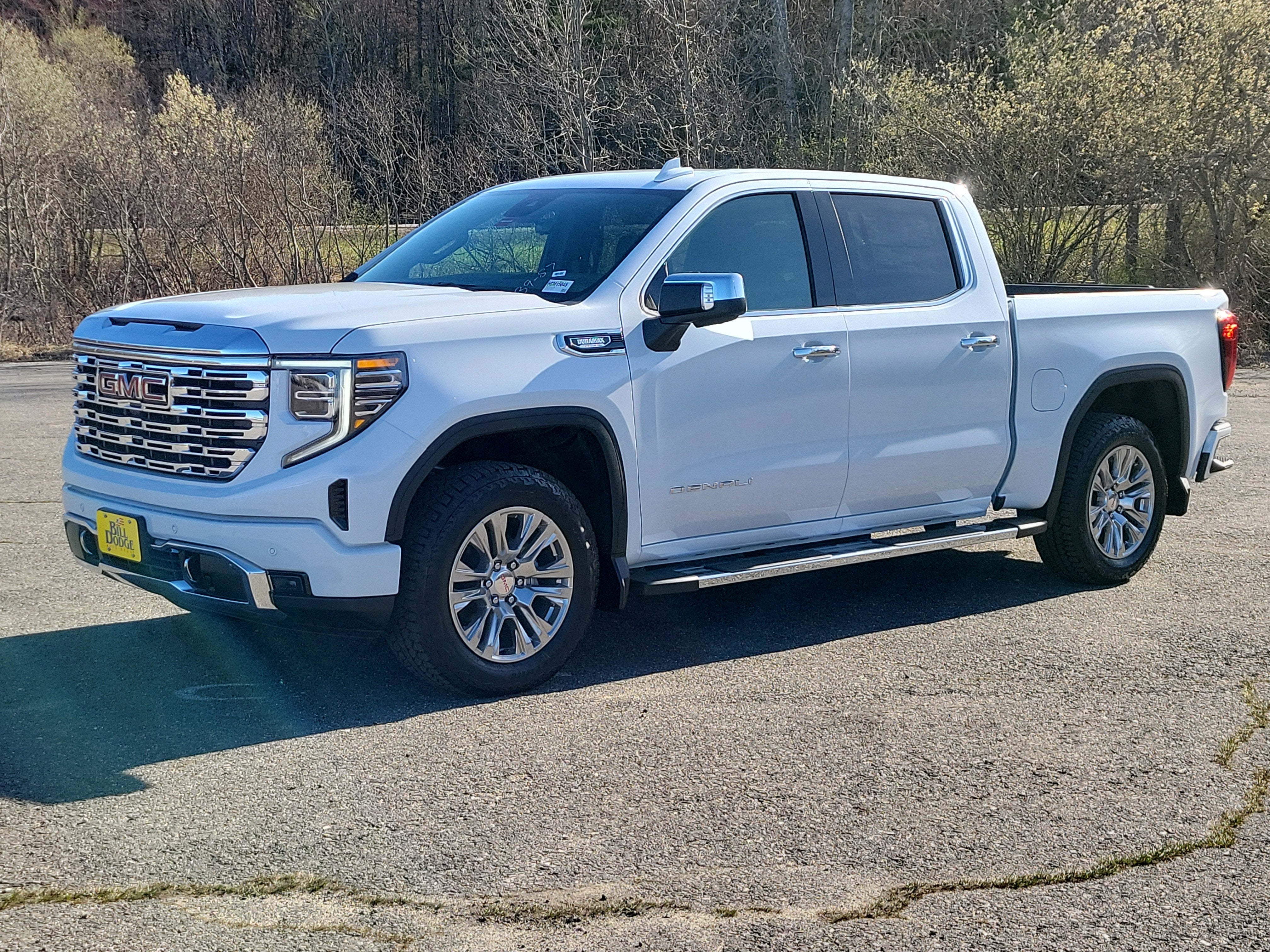2026 GMC Sierra 1500 Denali in Glacier White Tricoat — front three-quarter view