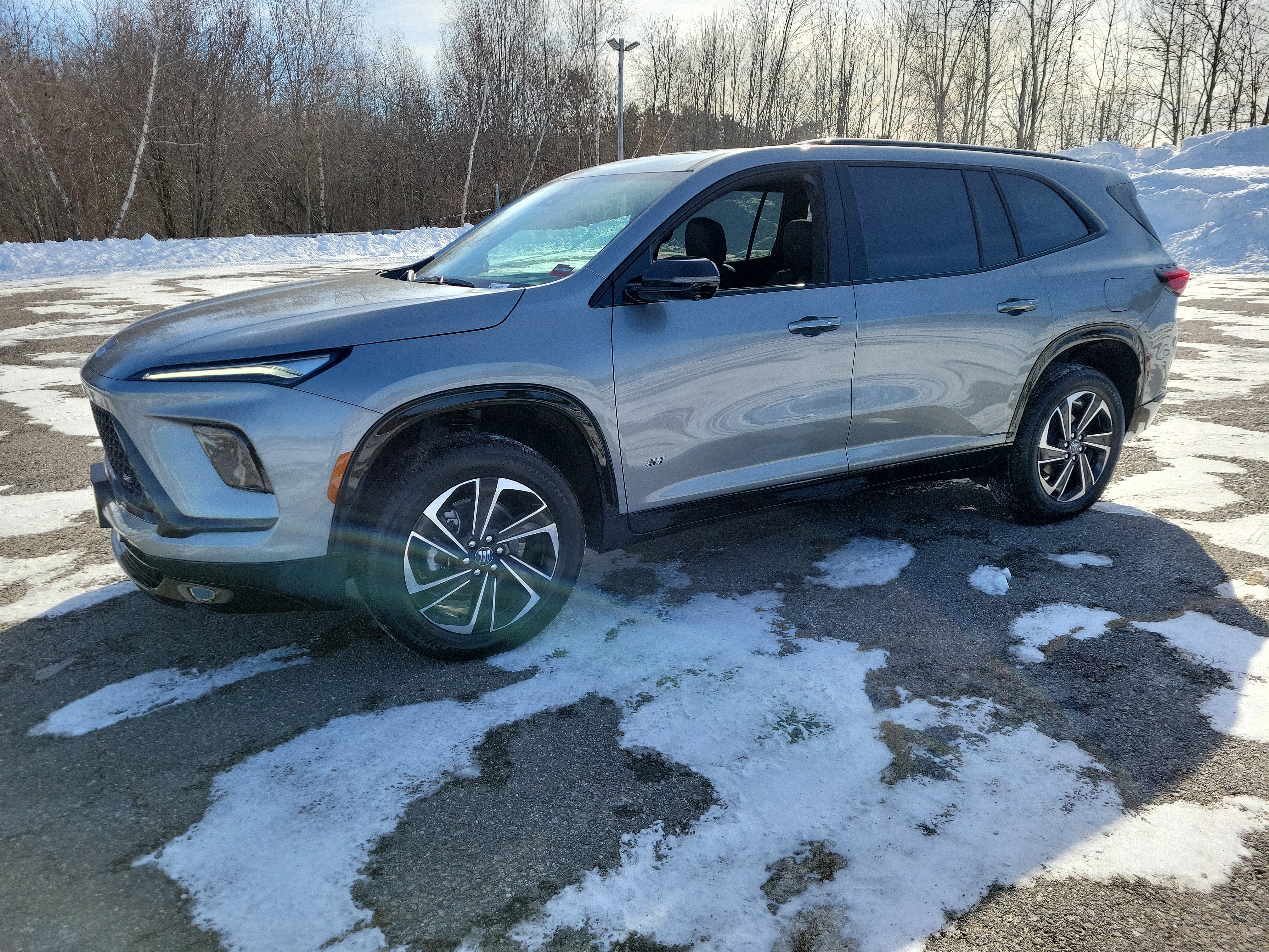 2026 Buick Enclave Sport Touring in Moonstone Gray Metallic — front three-quarter view