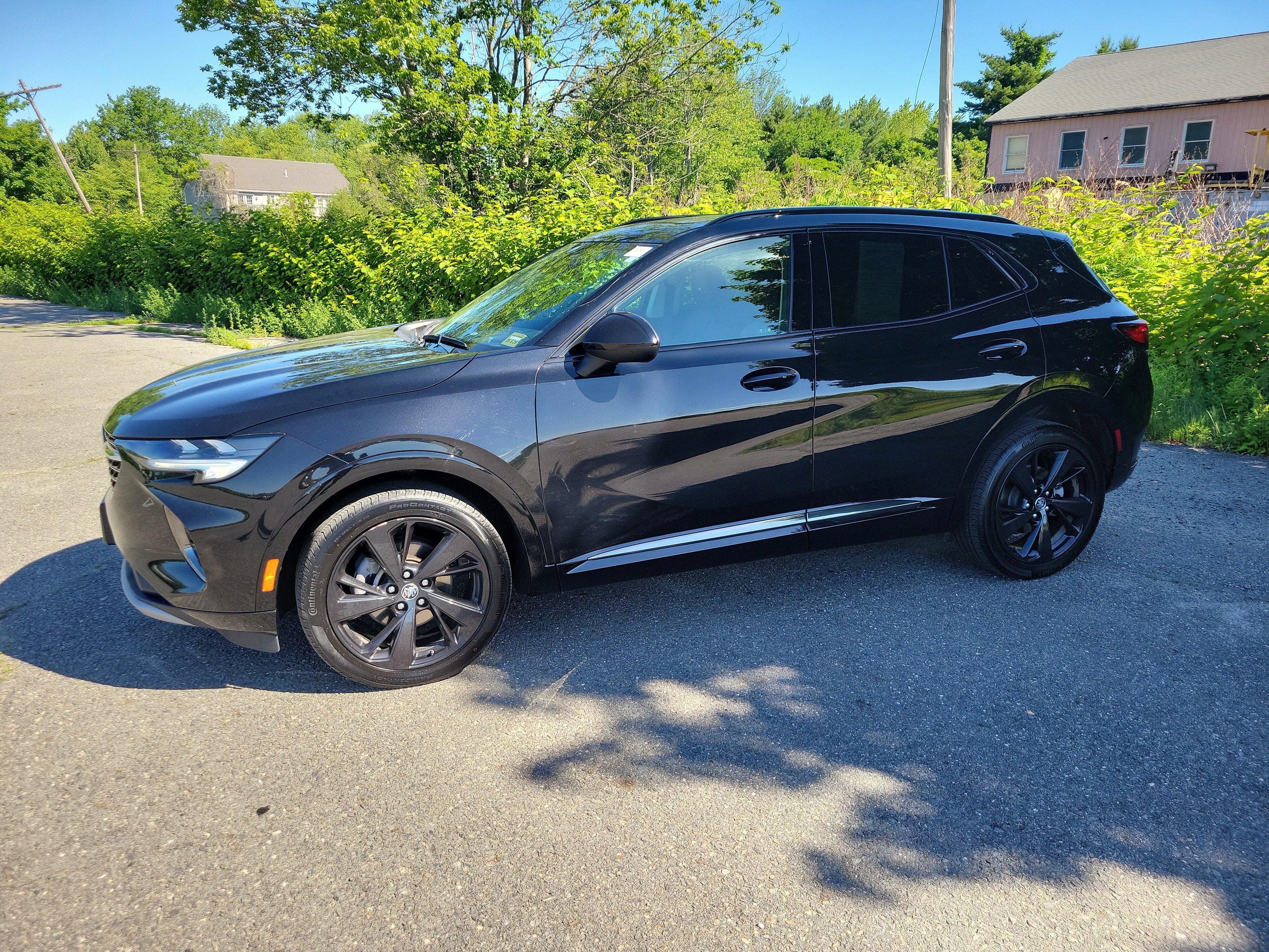 2023 Buick Envision Essence in Ebony Twilight Metallic — front three-quarter view