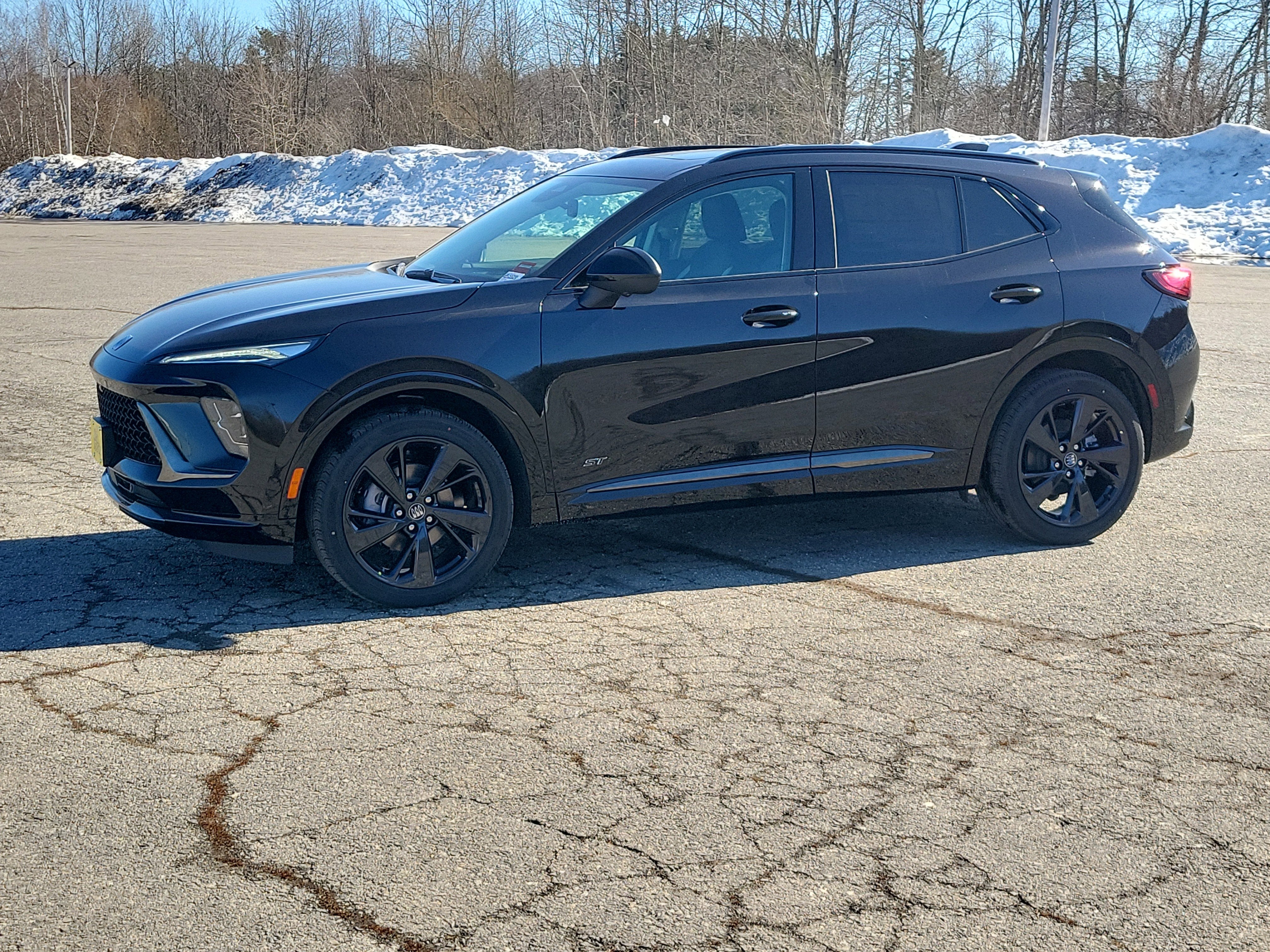 2026 Buick Envision Sport Touring in Ebony Twilight Metallic — front three-quarter view